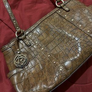 Vintage tan relic purse